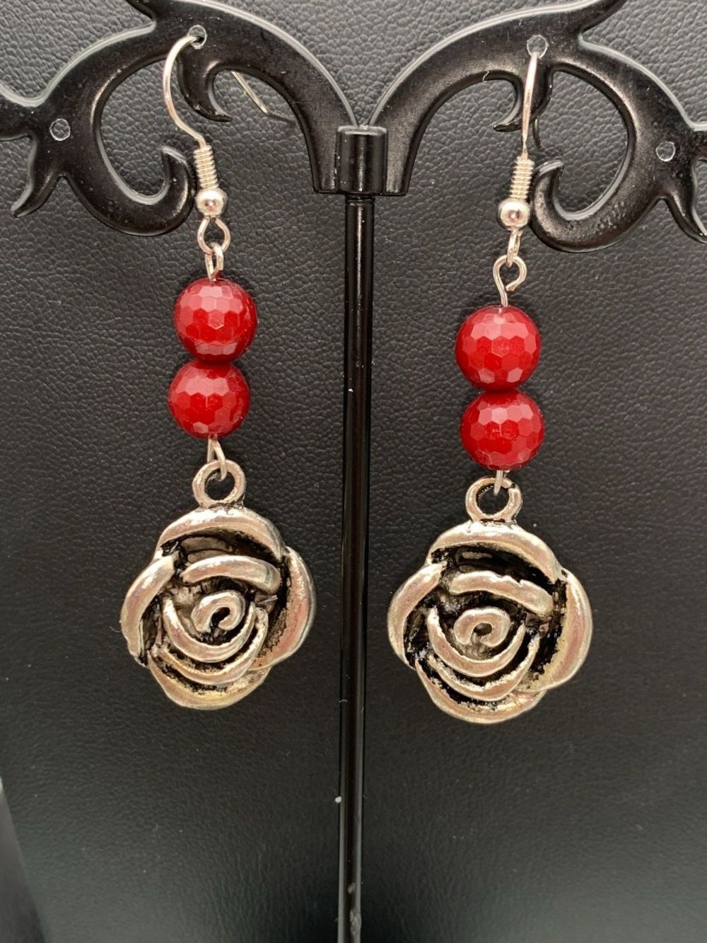 Antiqued silver tone Rose earrings with dark red faceted beads